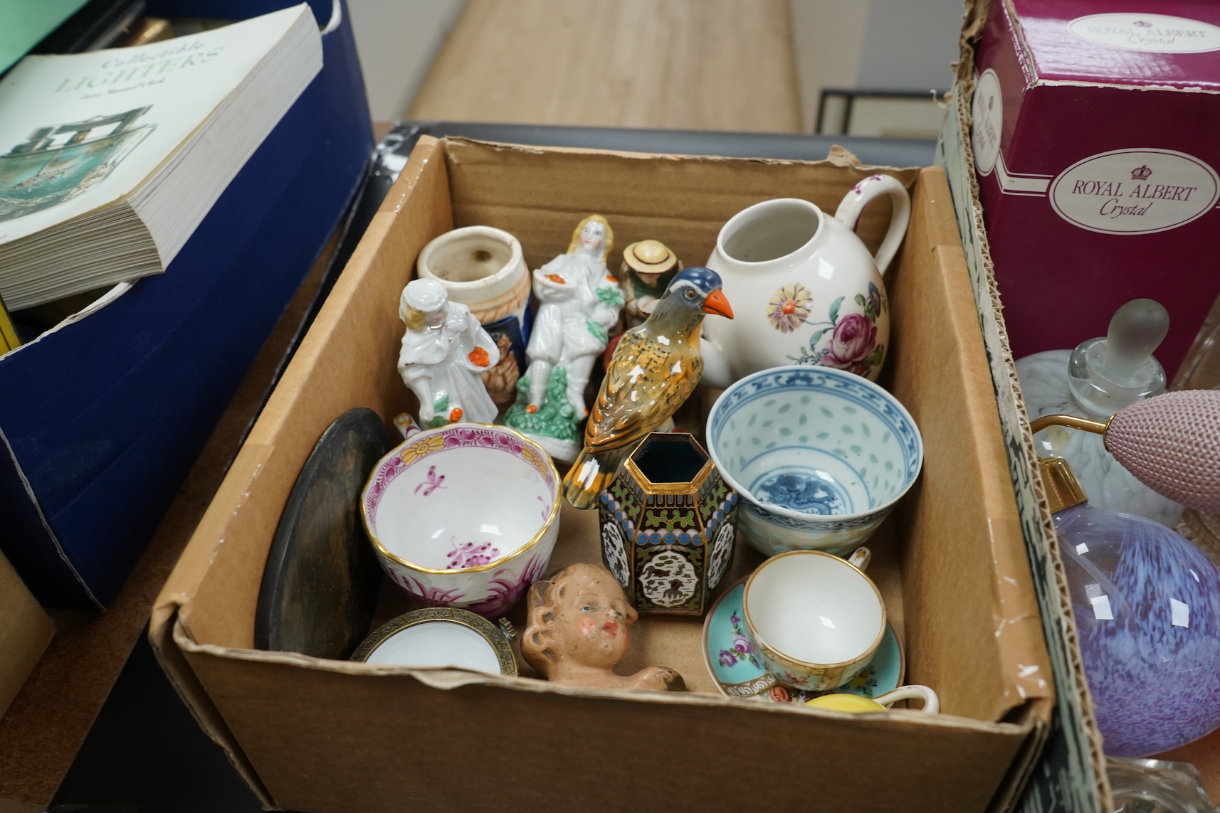 A collection of early 20th century French faience glazed animals, mostly cattle, largest 15cm
